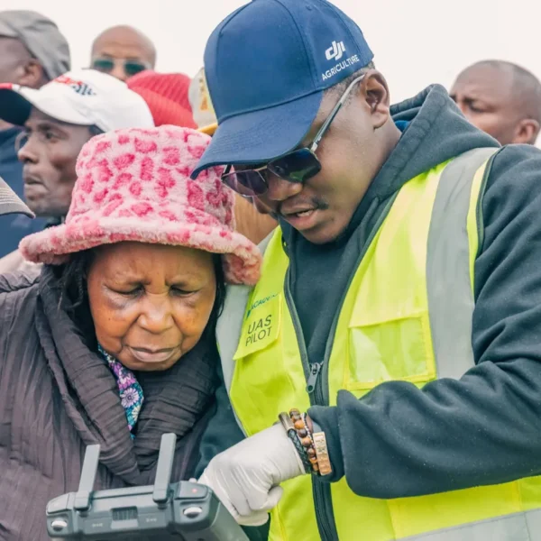 Community members learning about responsible drone operations